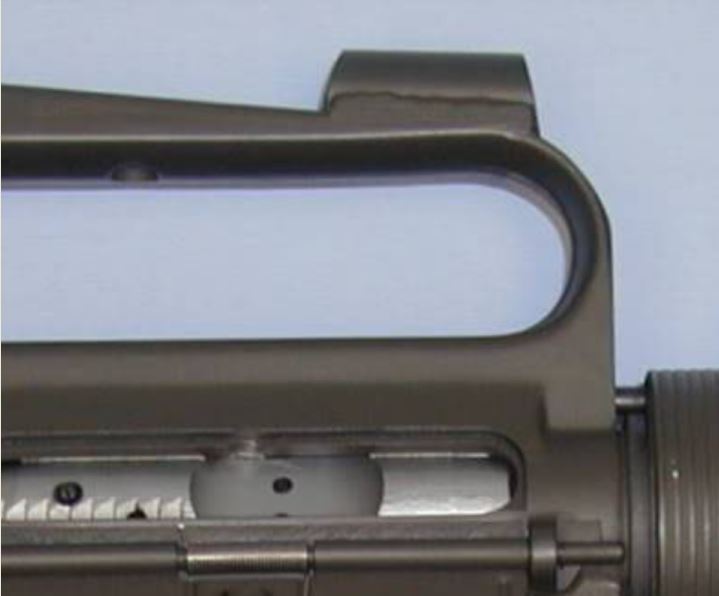 One version of the M16k used a ghost ring front sight consisting of a metal tube welded onto the carry handle