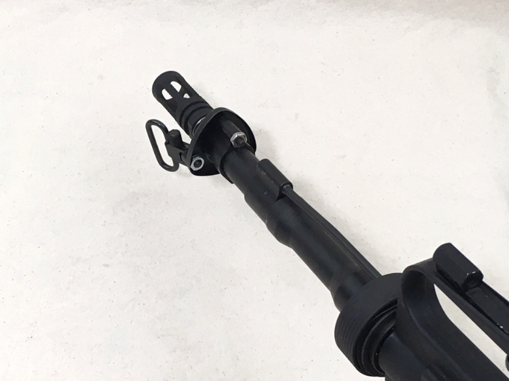 The AR-k pistol length gas system and bolted on handguard cap and swivel stud